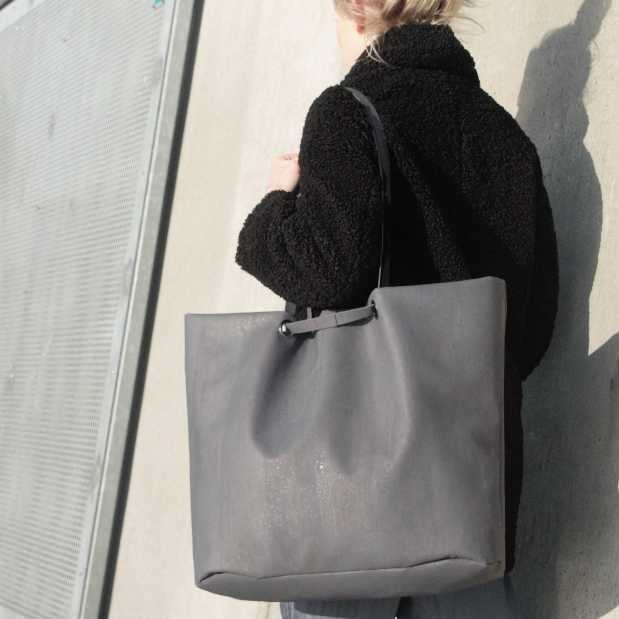 Grey cork leather Carry-All bag, worn over shoulder